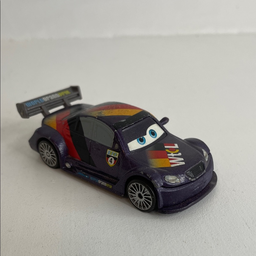 Disney Pixars Cars 2 🇩🇪Max Schnell  German Car World Grand Prix Die-cast 1:55